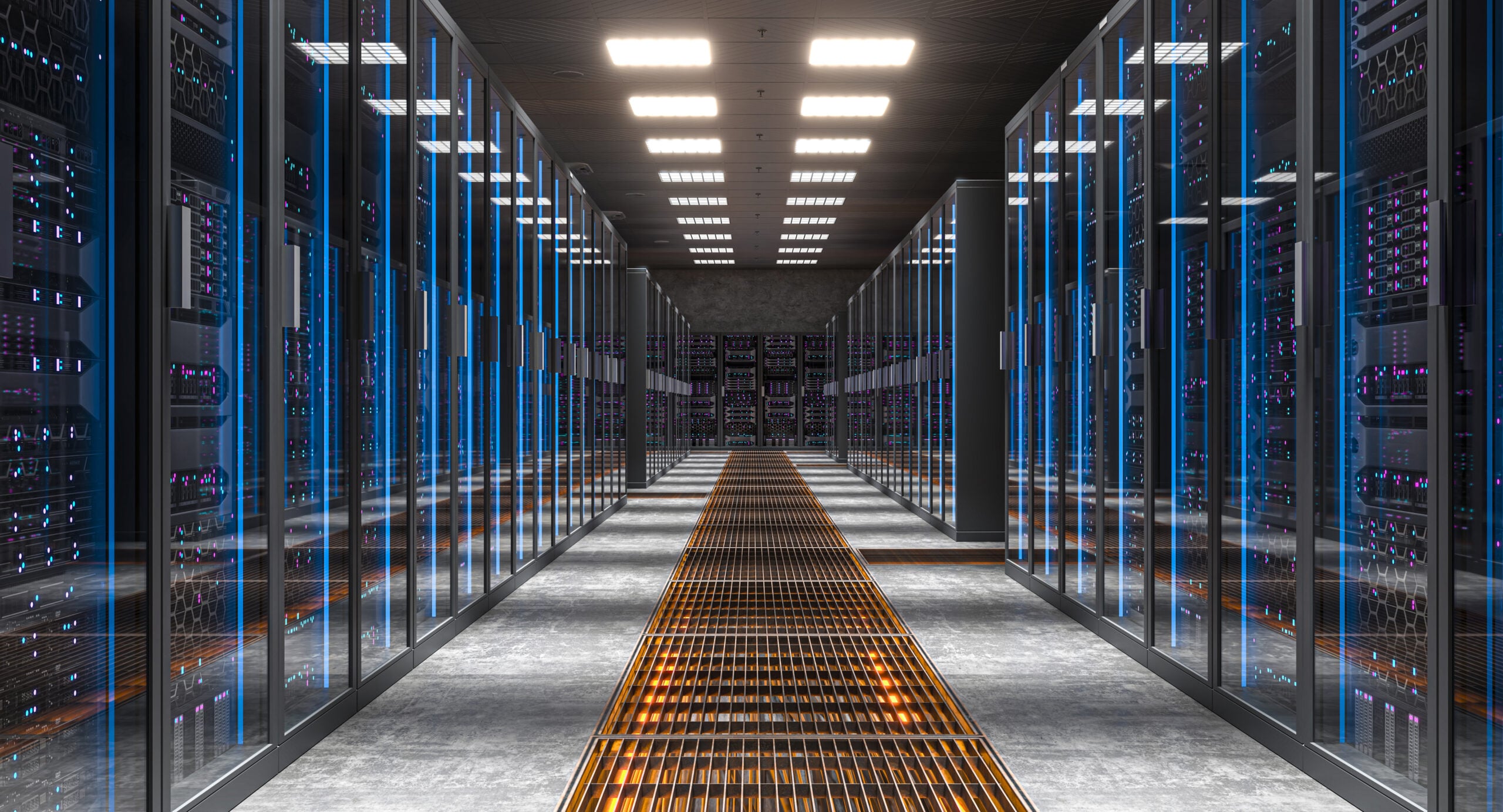 Server room with rows of glowing blue server racks and a metal walkway.